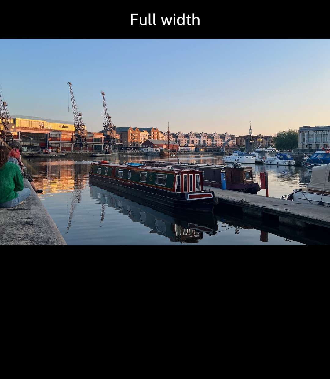 A harbour photo extending to both screen edges.