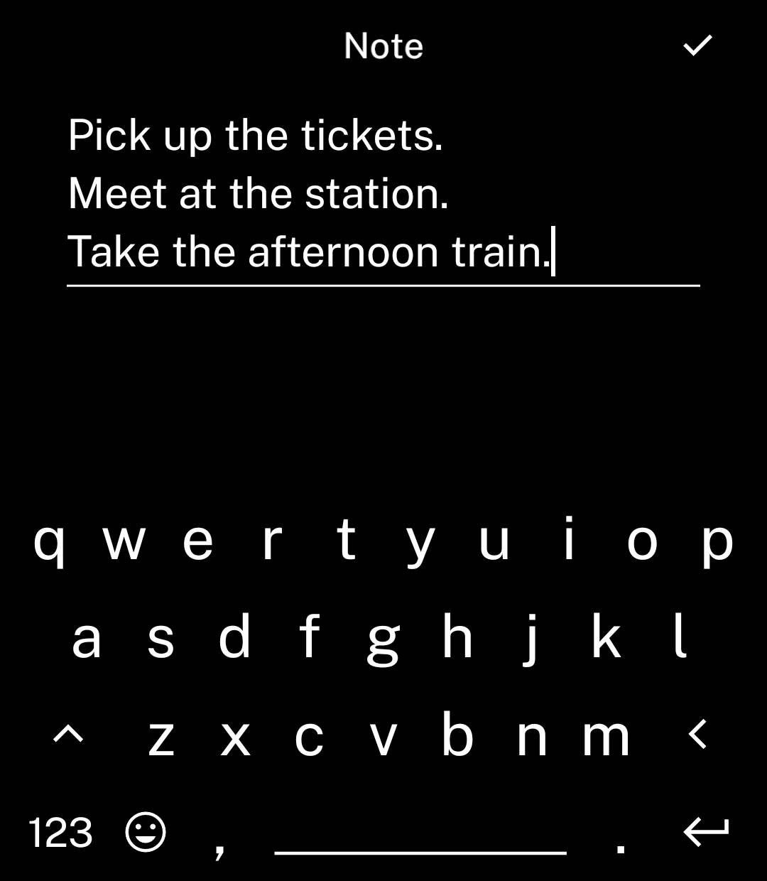A multiline note with a tick in the header and Return on the keyboard.