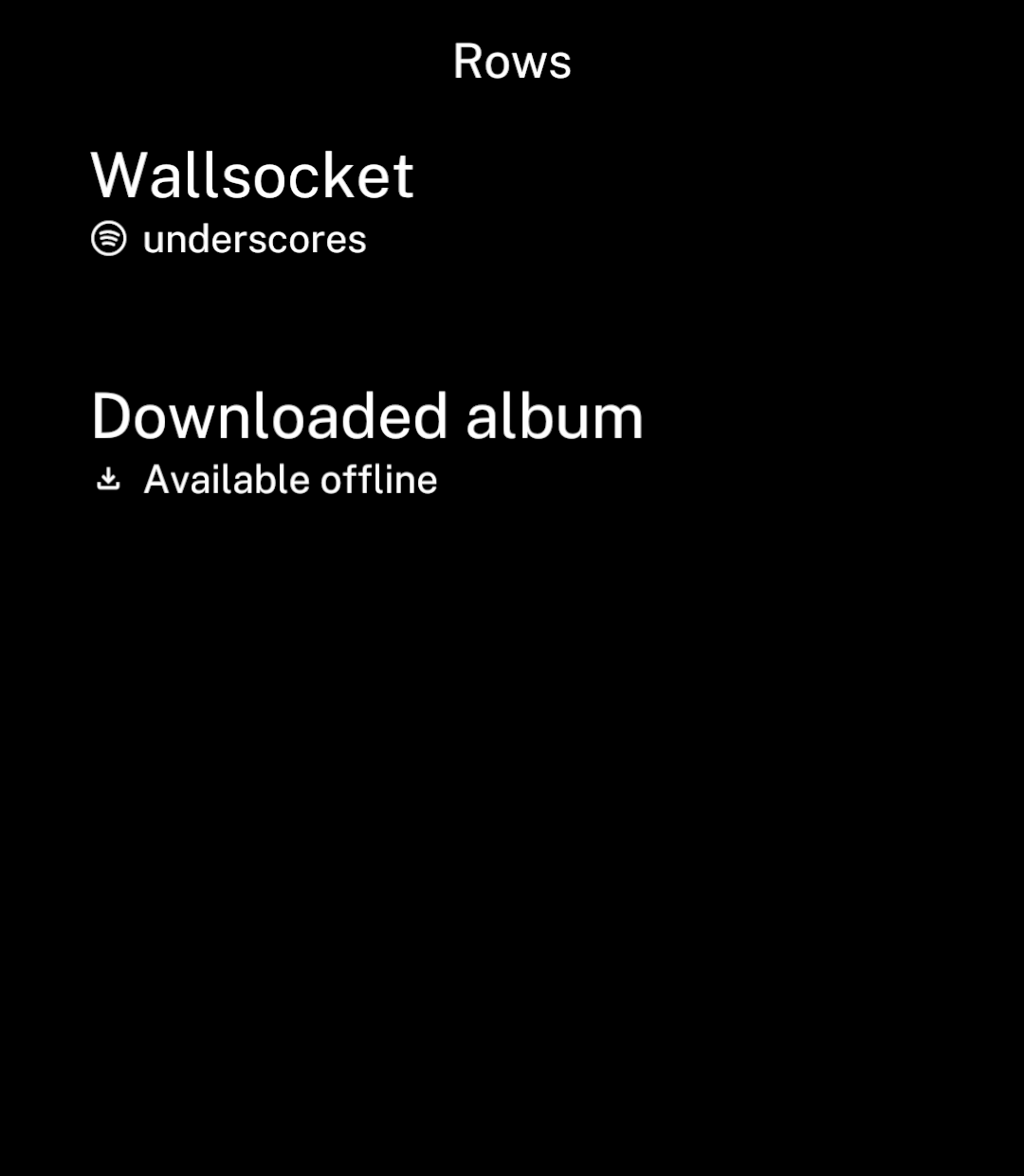 Album rows with Spotify and download icons beside their subtitles.